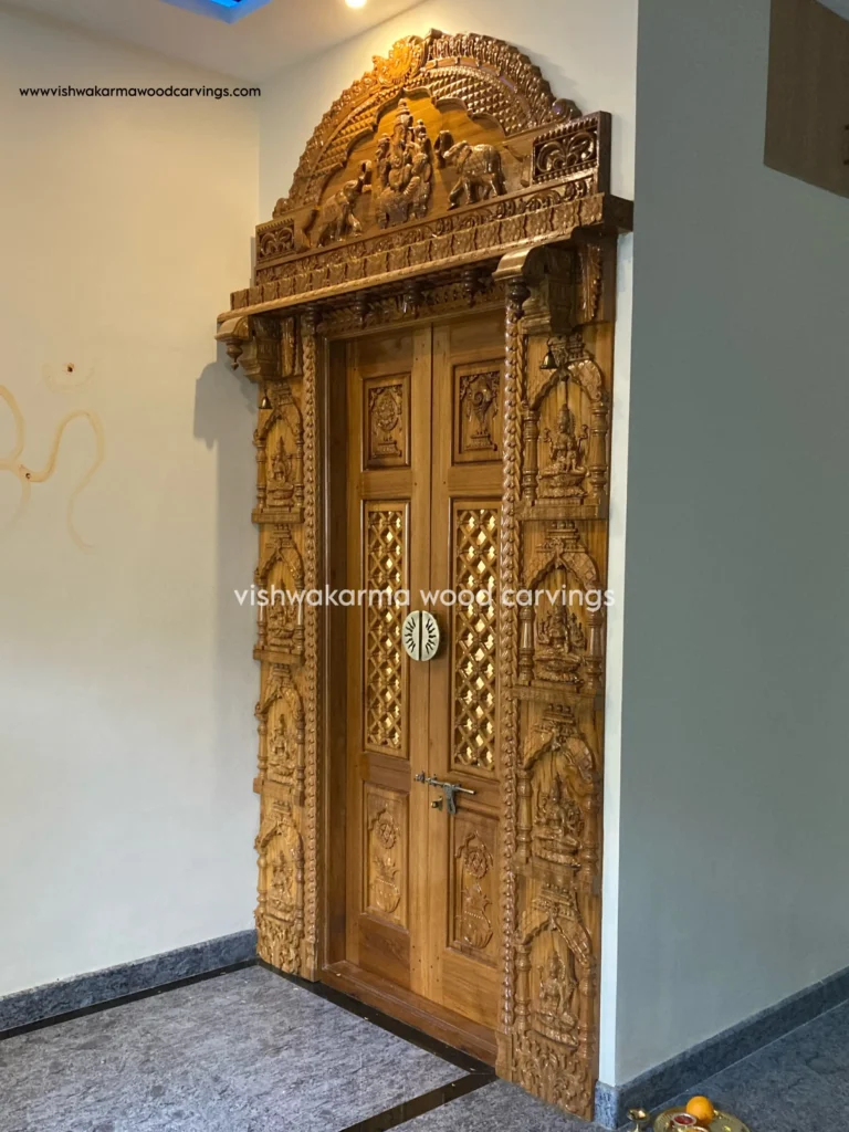 Hand-carved wooden pooja room featuring Astalakshmi and Ganesha carvings by Vishwakarma Wood Carvings