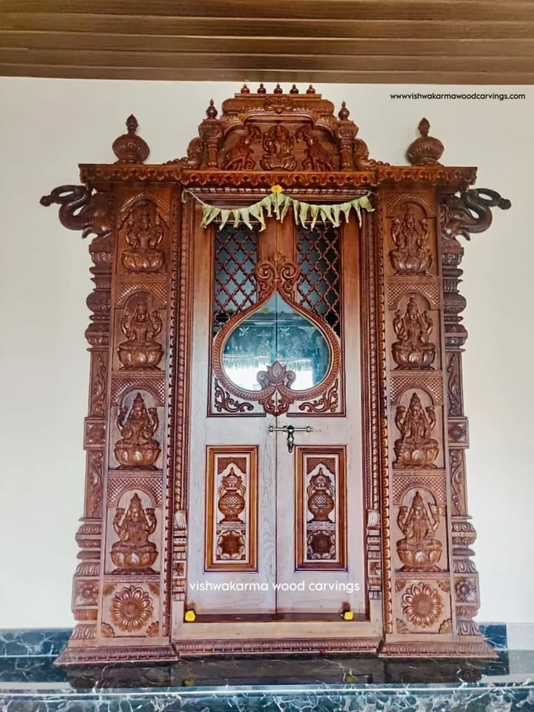 Ashta Lakshmi wooden mandapa design with detailed hand-carved depictions of eight Lakshmi forms by Vishwakarma Wood Carvings
