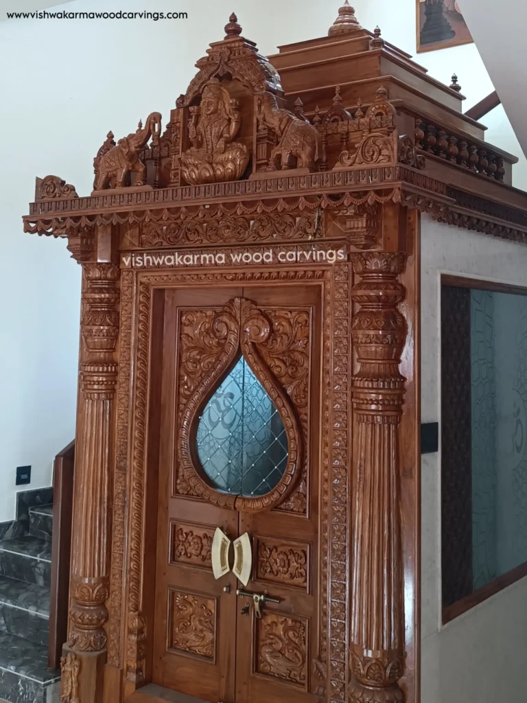Hand-carved Goddess Lakshmi wooden panel with traditional temple-style pillars