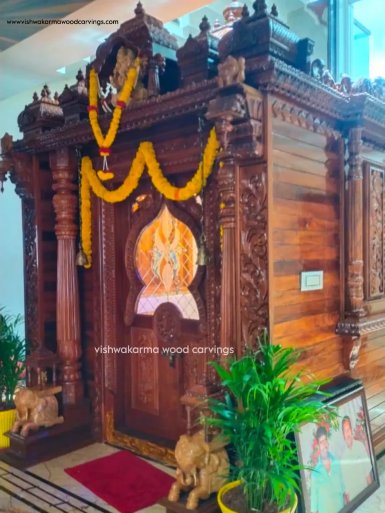 Handcrafted wooden pooja mandir with detailed traditional carvings and decorative pillars